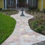 flagstone path with fountain in center