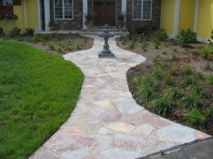 flagstone path with fountain in center